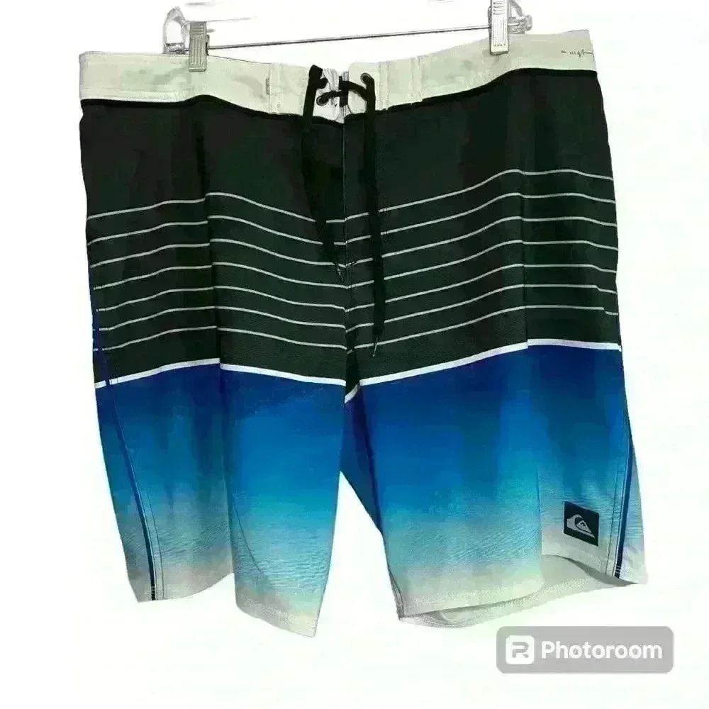 Quiksilver Black and Blue Swim Trunks. Size: 38